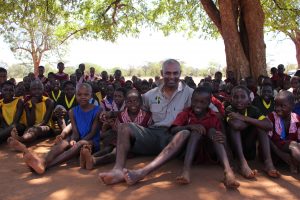 Sitting-barefoot-with-kids-300x200 An African Holiday with a Conscience - The African Blog Series - Part 2